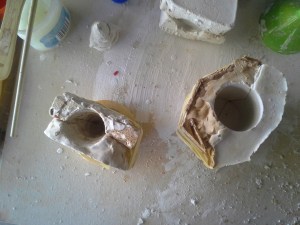 Moulds ready to be poured with plaster and candle wax
