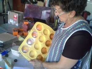 Margie preparing the glitter for the muffin candles